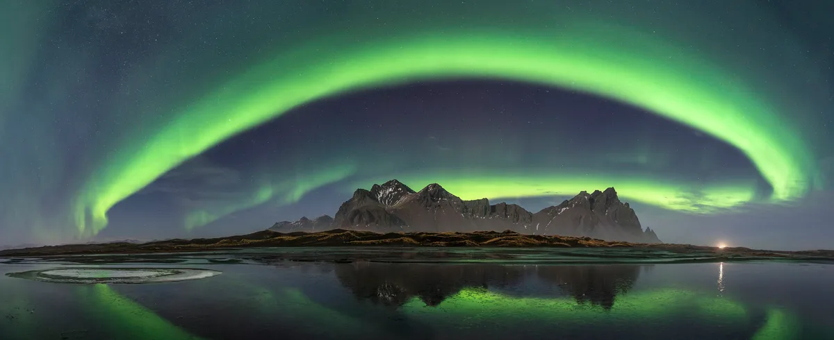 Celestial Arch © Luis Vilariño (Spain). Runner-up, Aurorae. Equipment: Sony ILCE-7RM4 camera, 14 mm f/1.8. Location: Stokksnes, Sveitarfélagið Hornafjörður, Iceland, 9 December 2024