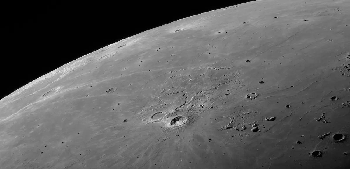 Aristarchus on the Moon © Raul Cantemir (Germany). Highly commended, Our Moon. Equipment: DIY 12" Newtonian Carbon telescope, Pierro-Astro ADC-MK3 atmospheric dispersion corrector, TeleVue 2.5x 1.25" Powermate, Baader Red filter, Sky-Watcher EQ8-R mount, ZWO ASI178MM camera, 3,350 mm f/11.25 with Barlow Lens, f/5 without lens. Location: Eberstadt, Darmstadt, Germany, 29 August 2024