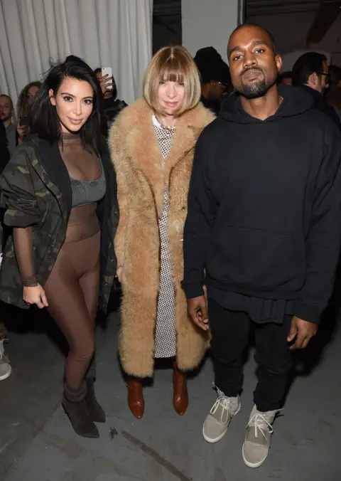 Dimitrios Kambouris/Getty Images for adidas Kim Kardashian, Anna Wintour, and Kanye West pose backstage at the adidas Originals x Kanye West YEEZY SEASON 1 fashion show during New York Fashion Week Fall 2015 at Skylight Clarkson Sq on February 12, 2015 in New York City.