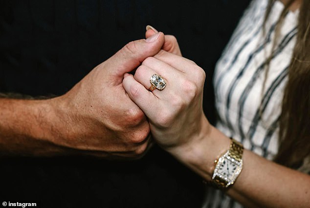 Swift shows off her ring after Kelce got down on one knee to propose to her recently