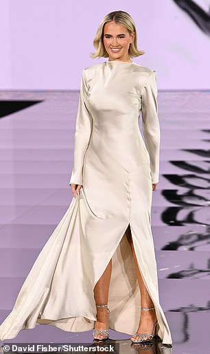 The influencer put on a showstopping display in a white satin gown