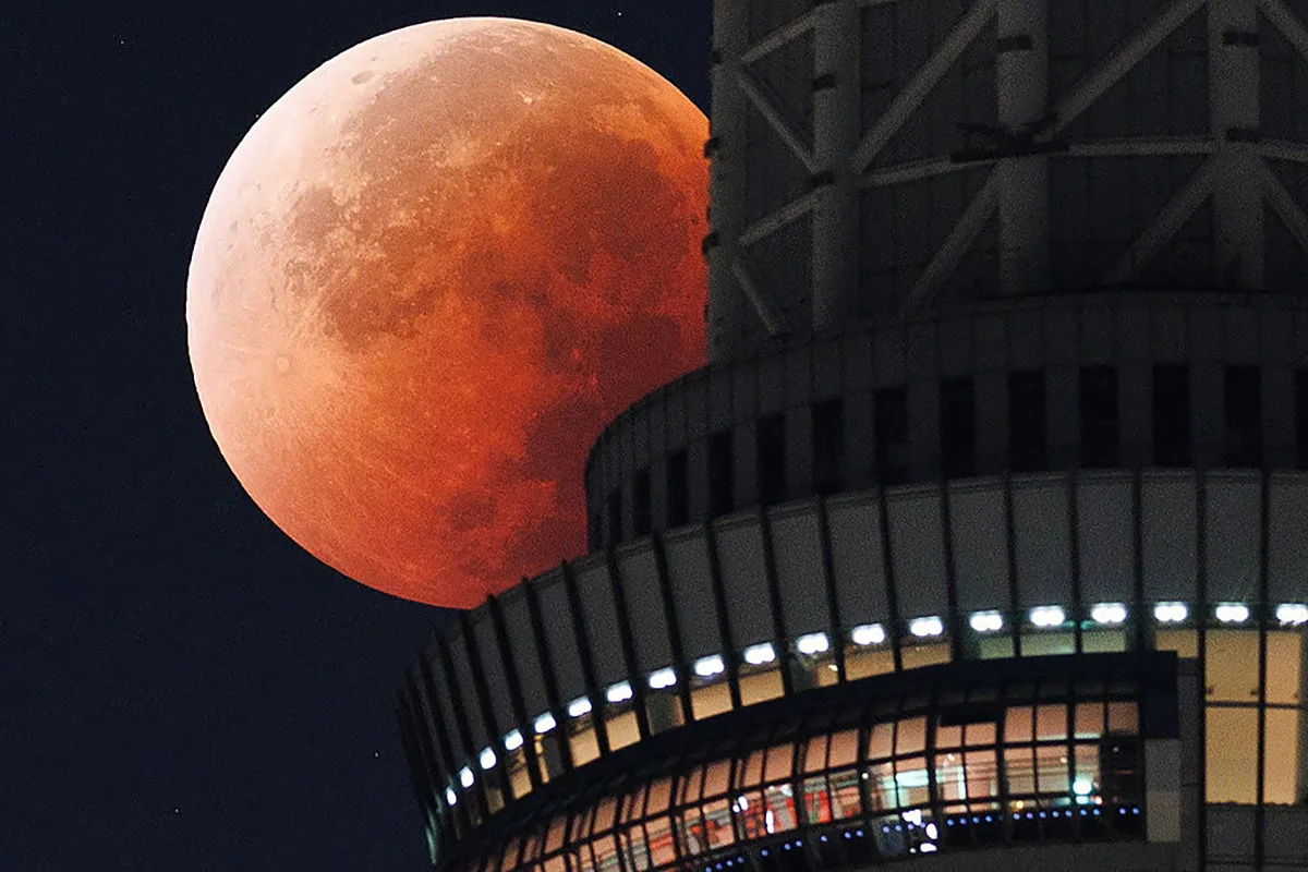 Blood Moon of 7 September 2025 behind the Tokyo Skytree, Tokyo, Japan. Photo by STR/JIJI Press/AFP via Getty Images