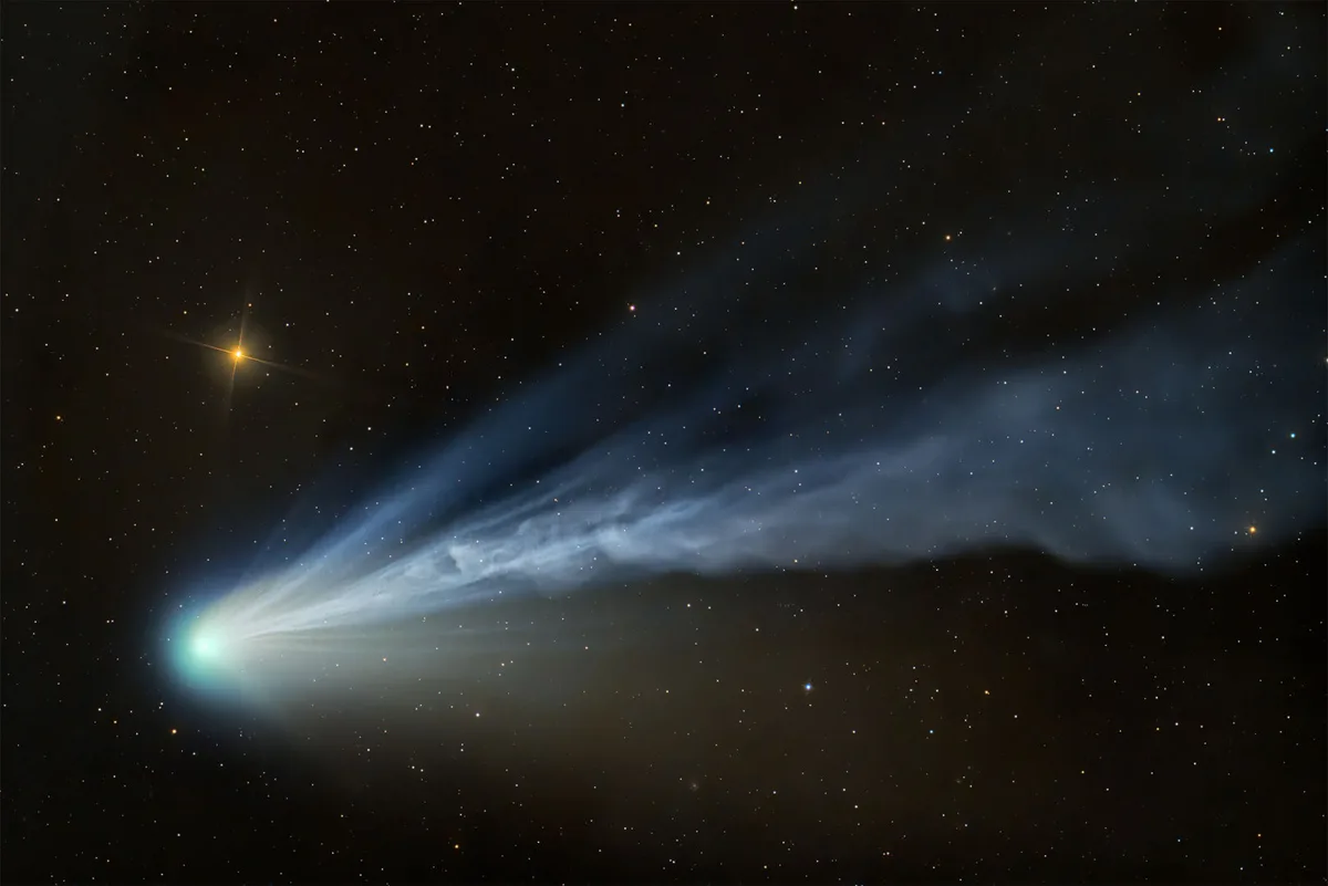 Comet 12P/Pons−Brooks Taking a Final Bow © Dan Bartlett (USA). Winner, Planets, Comets and Asteroids. Equipment: with a Celestron C14Edge HD SCT telescope with HyperStar V4 lens, 10Micron GM 2000 HPS mount, ZWO ASI2600MC Pro camera, 712 mm f/2, 25 x 30-second exposures. Location: June Lake, California, USA, 31 March 2024
