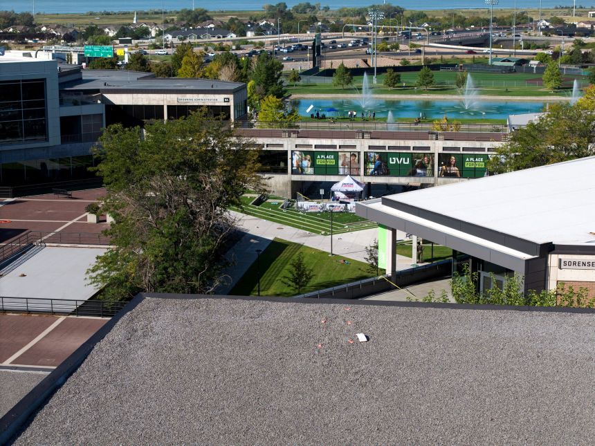 A drone view shows the reported location of the shooter on a rooftop, at the scene where Kirk was shot.