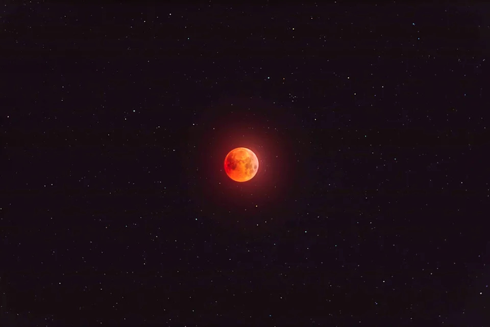 A bright red full moon