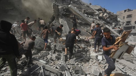 Gaza City residents unable to leave as Israel strikes residential building – video