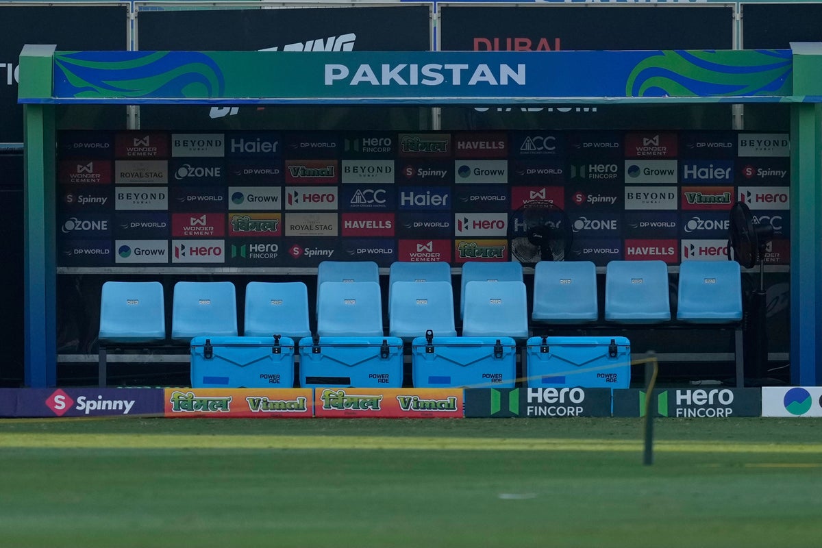 Pakistan’s handshake dispute with India delays start of its Asia Cup cricket game against UAE