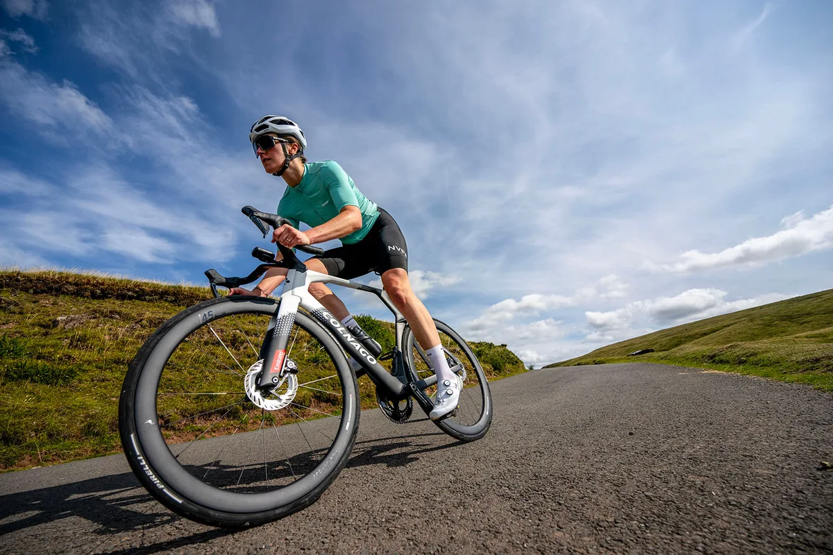 Female cyclist riding the Colnago Y1Rs aero road bike