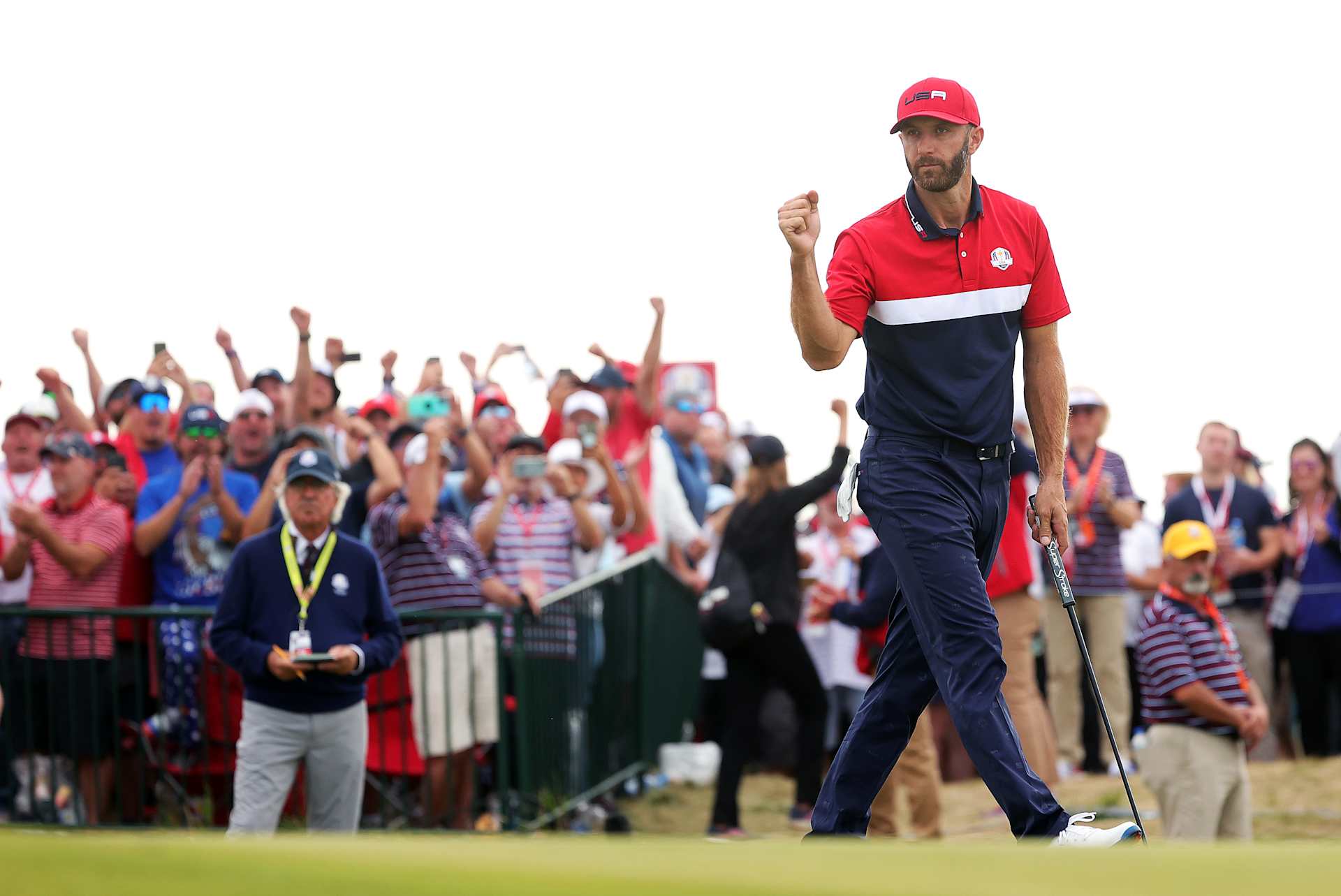 KOHLER, WISCONSIN - SEPTEMBER 26: Dustin Johnson of team United States celebrates on the 15th green during Sunday Singles Matches of the 43rd Ryder Cup at Whistling Straits on September 26, 2021 in Kohler, Wisconsin. (Photo by Stacy Revere/Getty Images)