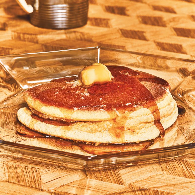 Fluffy Japanese pancakes on a clear plate
