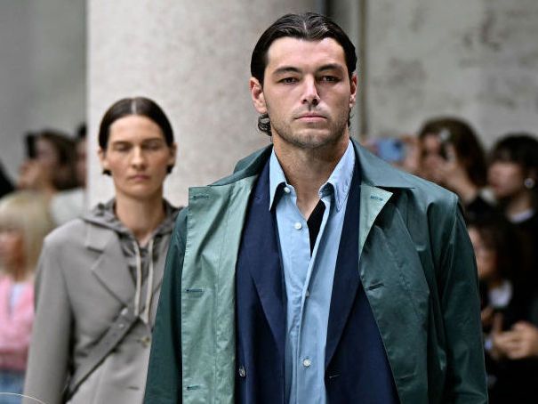 Team World's Taylor Fritz walks the runway during the BOSS collection show at Milan's Fashion Week in 2024.