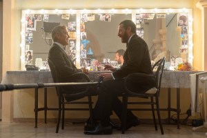 Jay Kelly. (L-R) George Clooney as Jay Kelly and Adam Sandler as Ron Sukenick on the set of Jay Kelly. Cr. Peter Mountain/Netflix © 2025.