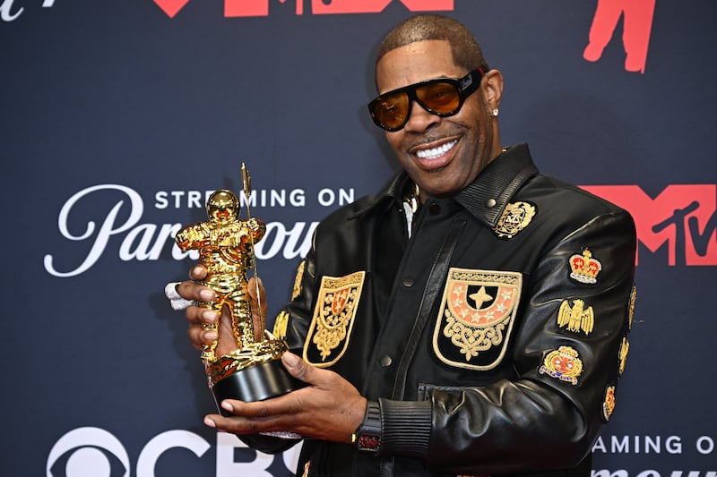 Busta Rhymes with the 'Rock the Bells' Visionary award at the MTV Video Music Awards. Photograph: Doug Peters/PA Wire