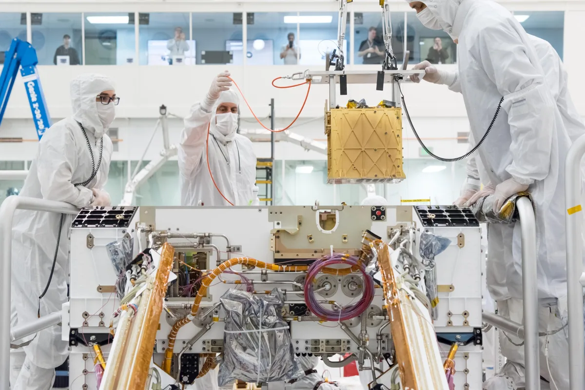 NASA engineers install the MOXIE instrument onto the Mars Perseverance rover at NASA's Jet Propulsion Laboratory, 20 March 2019. Credit: NASA JPL/Caltech