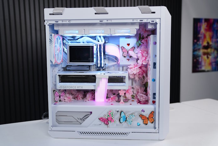 A white gaming PC built with ROG gaming components with butterflies