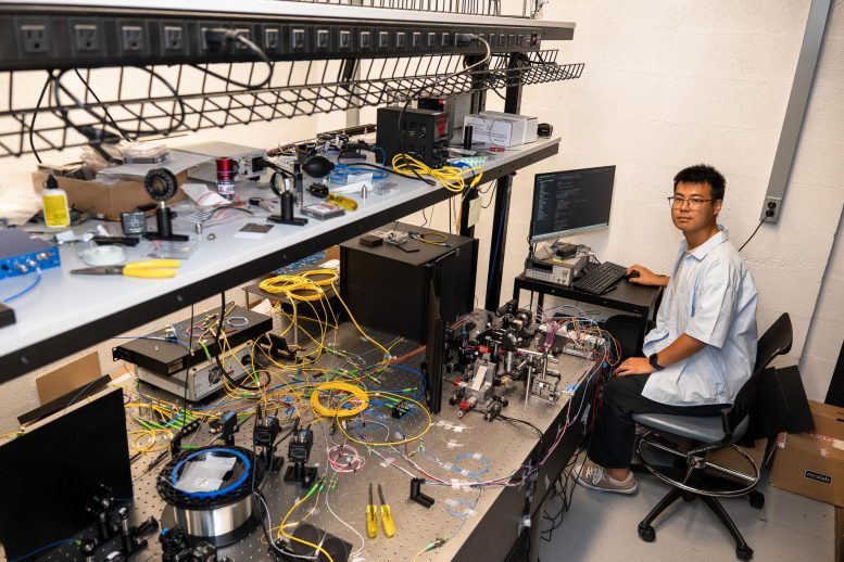 Yichi Zhang Working With Fiber Optic Cables