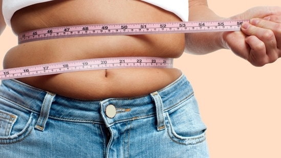 Reduce weight to immediately alleviate arterial stiffness risks. (Shutterstock)