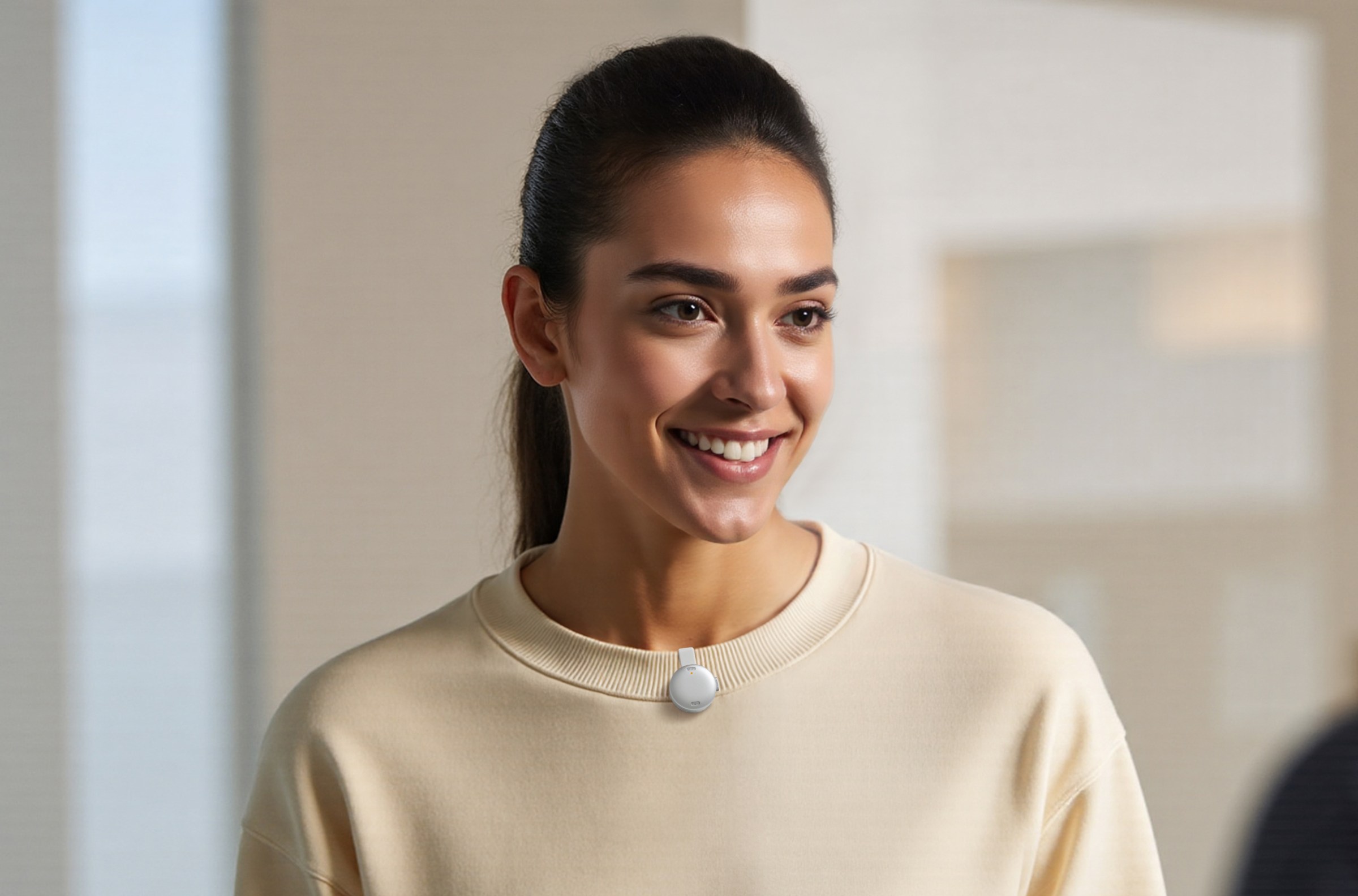 A person wears the Anker Soundcore Work AI voice recorder clipped to their sweater.