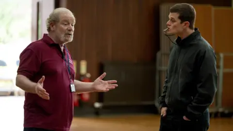 Studio Canal Robert Aramayo plays John in the film, with Peter Mullen among the cast