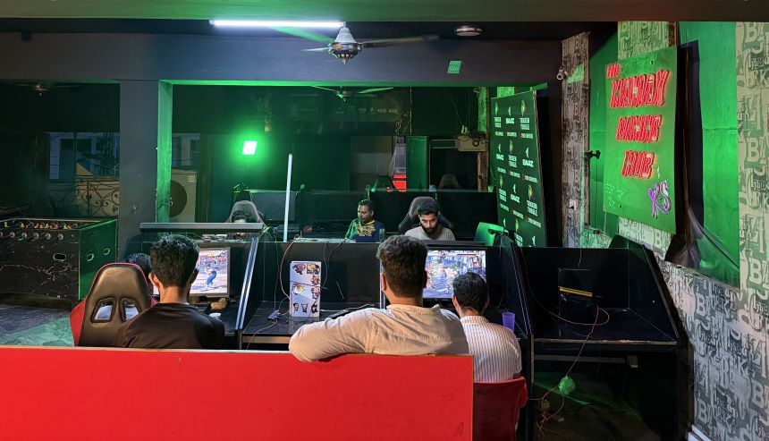 Gamers practice at the Maniax arcade.