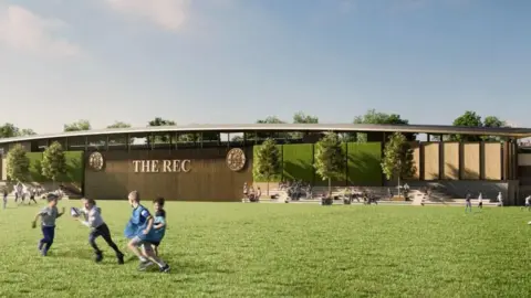 Bath Rugby CGI image of what the stadium could look like, from the side of the green spaces surrounding the stadium. A bronze buildings boasts the name "THE REC" and there are children playing on the green.