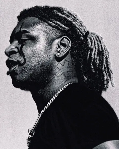Lantz Martin A side view of US rapper and record producer Ken Carson in black and white