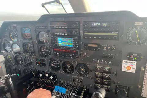 The cockpit of a small plane