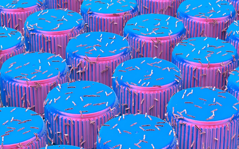 A conceptual illustration of plastic-eating bacteria consuming bottle tops.