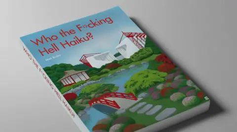 Matt Eccles A book with an illustration of a white football stadium with red stanchions and a Japanese-style garden in front. The words "Who the F*cking Hell Haiku?" are in red.