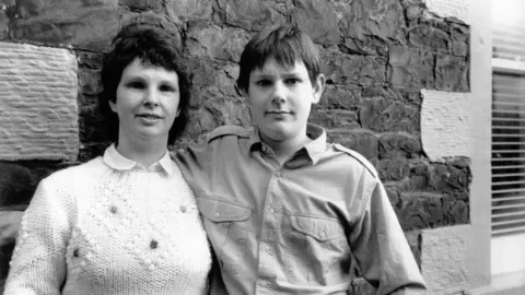 Picture shows (l-r) Mrs. Davidson with her son John.