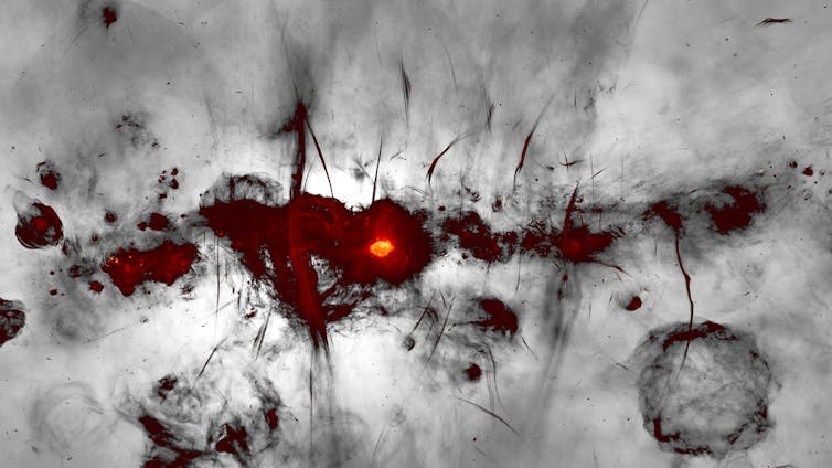 a red blotch against a grey background