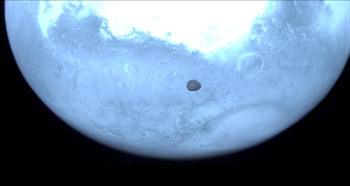 Mars and its moon Deimos as seen in near-infrared by the Hera spacecraft's Hyperscout H instrument during a flyby on 12 March 2025. Credit: ESA