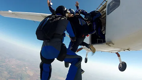 Getty Images Caption: Subject S M jumped out of a plane on a skydive and felt no fear because of her  condition (Credit: Getty Images)