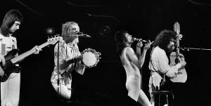 John Deacon, Roger Taylor, Freddie Mercury (1946 - 1991) and Brian May of Queen at the Chicago Stadium on January 28, 1977 in Chicago, Illinois.