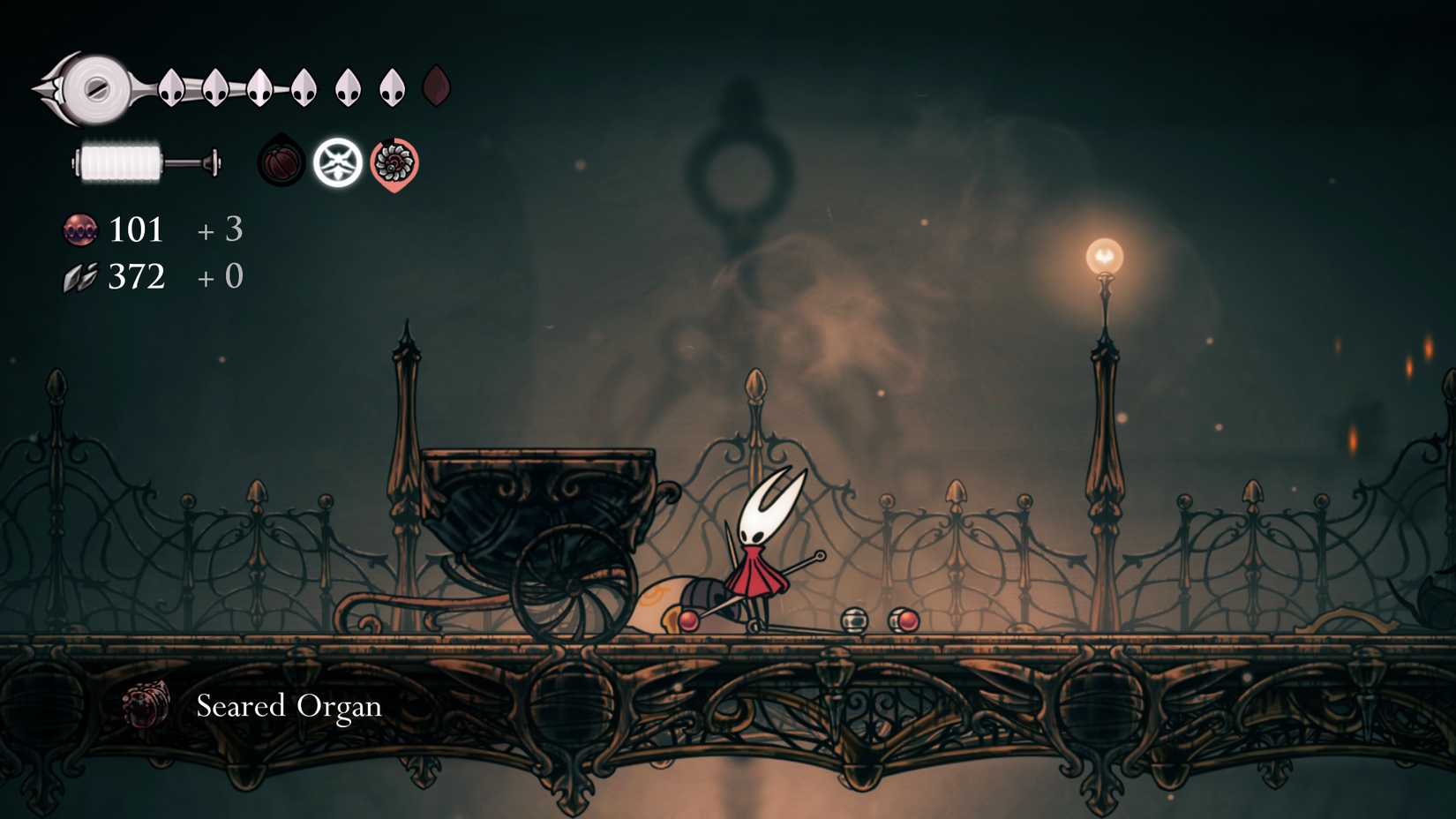 Hornet acquiring a seared organ in Silksong