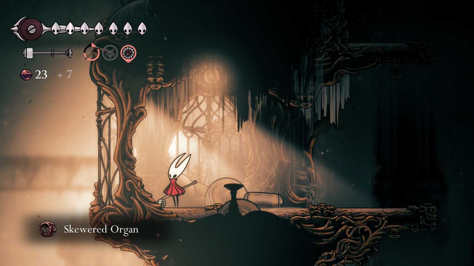 Hornet gathering a skewered organ in Silksong