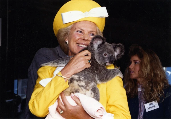 Her Royal Highness the Duchess of Kent holds a koala during a 1988 visit to Brisbane, Australia. Credit: Queensland State Archives, CC BY 3.0 AU, via Wikimedia Commons
