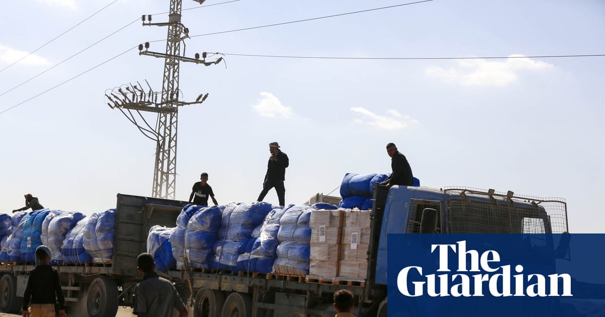 Israel limits aid into Gaza in dispute over hostage remains as ceasefire faces test | Gaza
