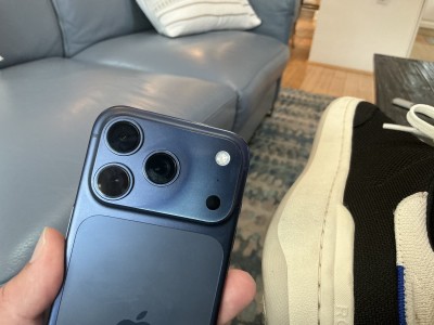 Decolorized iPhone 17 Pro Max in Cosmic Orange and Deep Blue