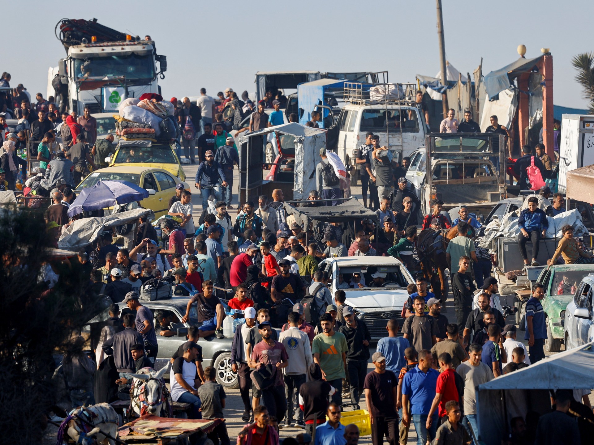 Tens of thousands return to shattered Gaza homes after ceasefire | Gaza News