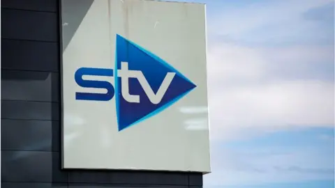 SNS A general view of the STV sign on its Glasgow headquarters on a sunny day.