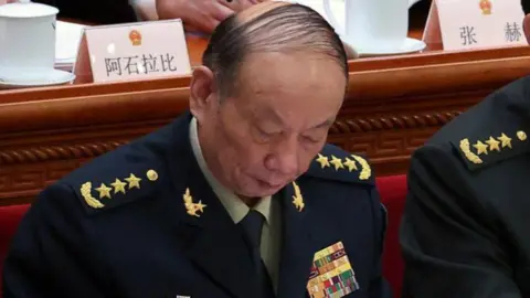 Reuters  Central Military Commission (CMC) member Zhang Shengmin attends the opening session of the National People's Congress (NPC) at the Great Hall of the People in Beijing, China March 5, 2025. REUTERS/Florence Lo/File Photo