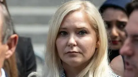 Getty Images Jeffrey Epstein victim Virginia Roberts Giuffre speaks at a press conference following a hearing where Jeffrey Epstein victims made statements, at Manhattan Federal Court
