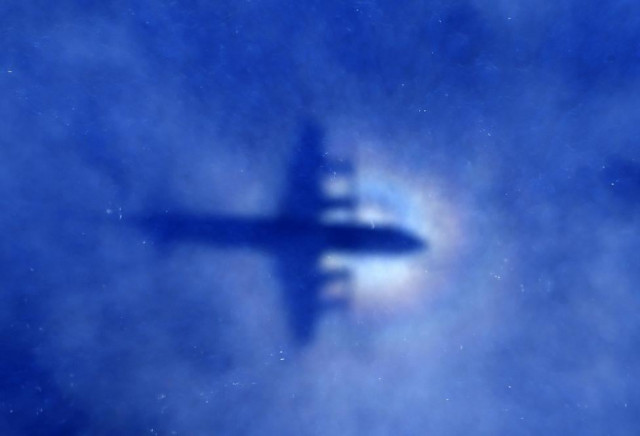 Cargo plane skids off HK runway, kills 2