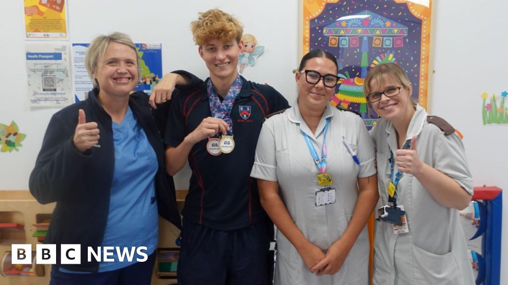 Ex-patient returns to Bristol hospital after swimming success