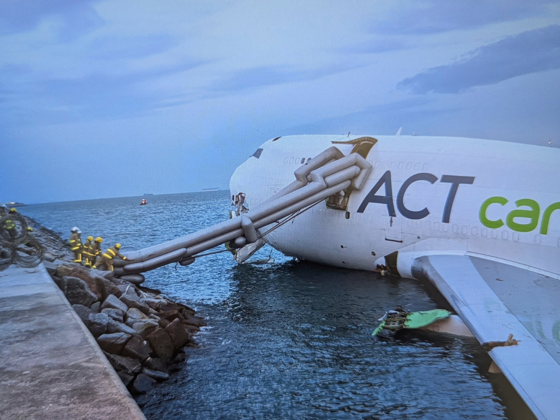 Two killed as cargo plane skids off Hong Kong runway | Aviation News