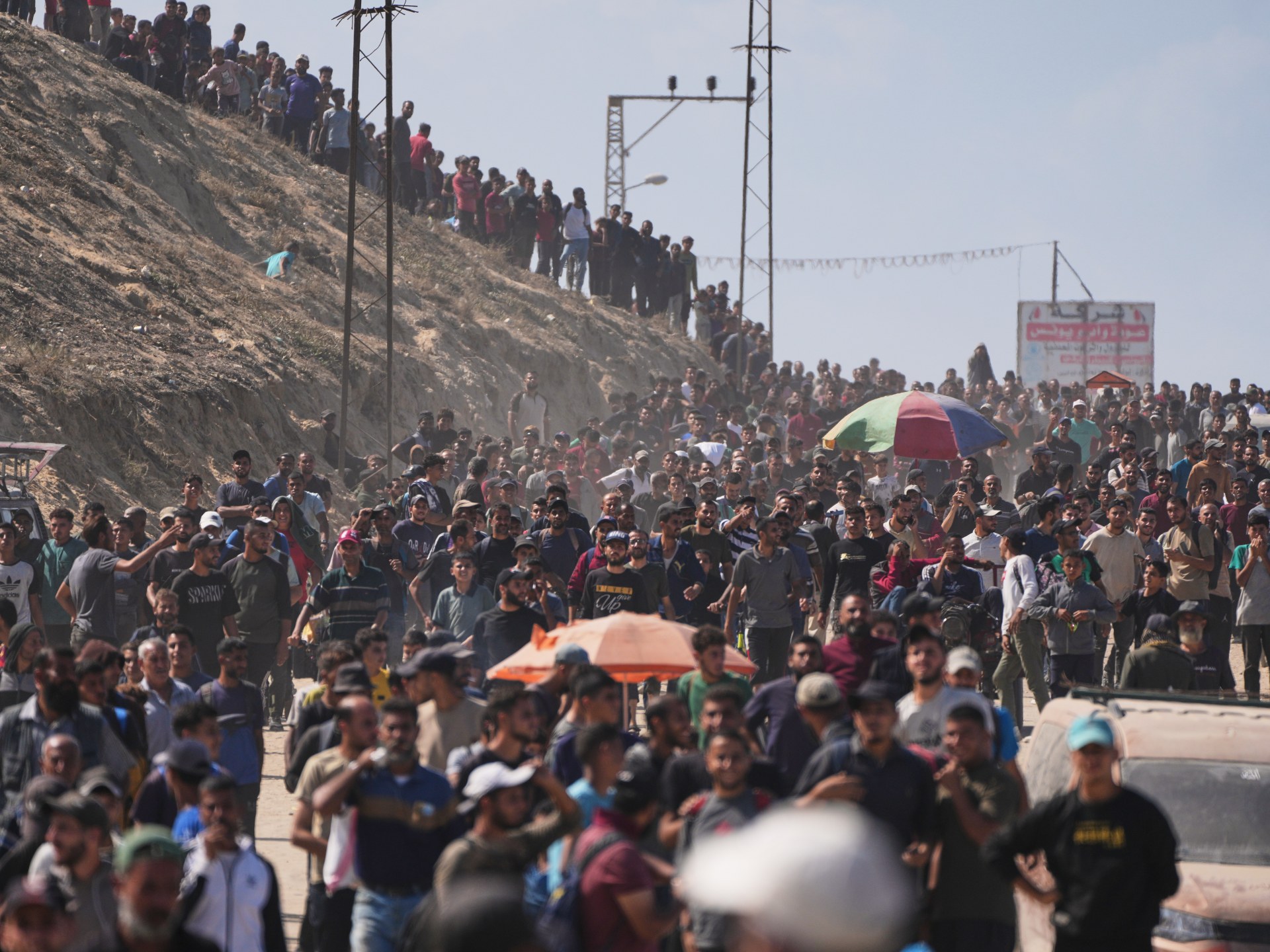 Displaced Palestinians begin pained journey home as Gaza truce takes hold | Gaza News