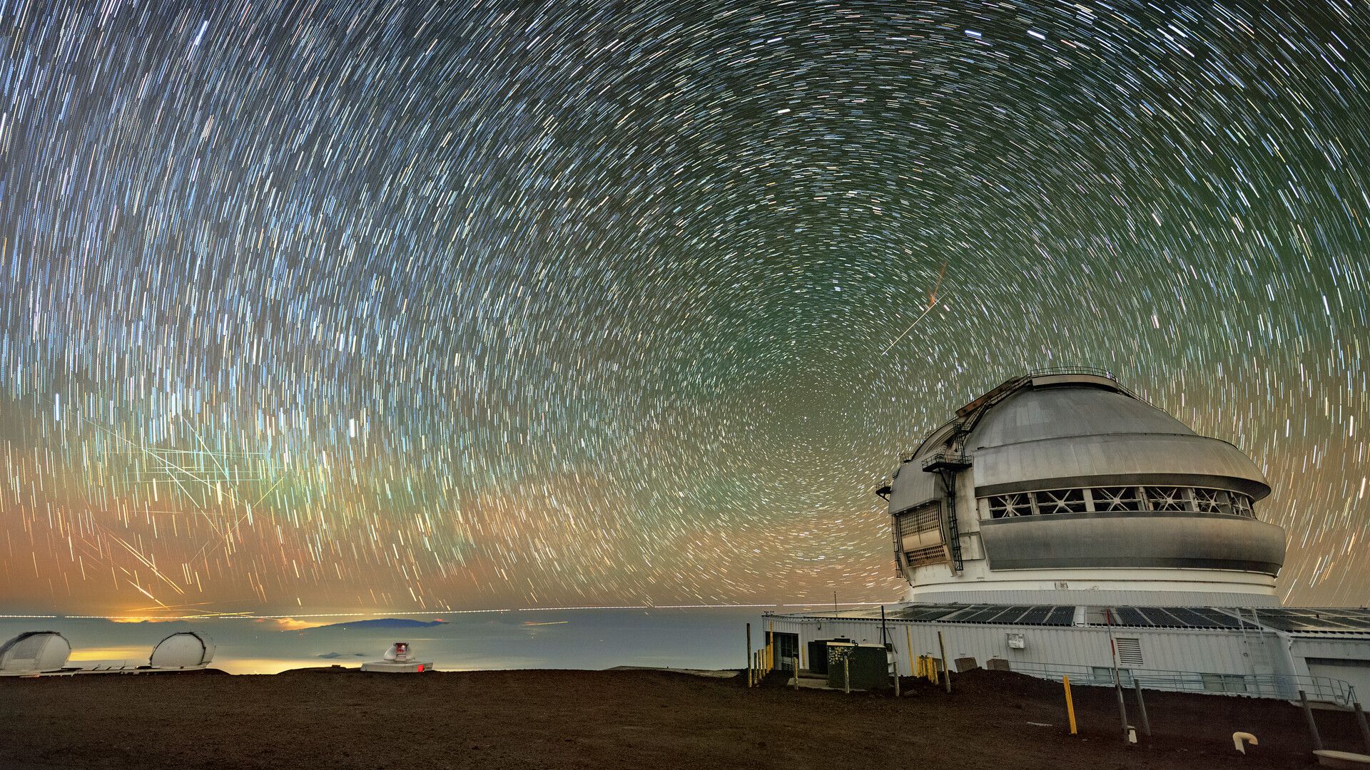 Stars and satellites streak over Gemini North telescope photo of the day for Oct. 17, 2025