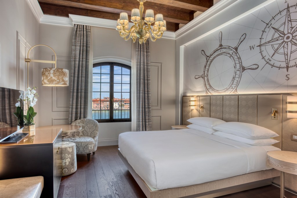 A bedroom looking out on to Venice