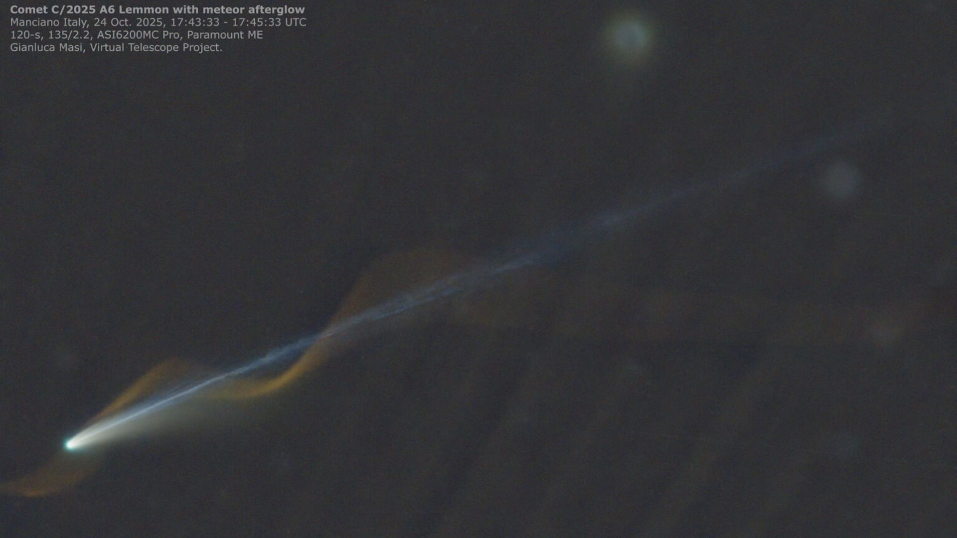 ‘Miracle’ photo captures Comet Lemmon and meteor seemingly entwined over Earth